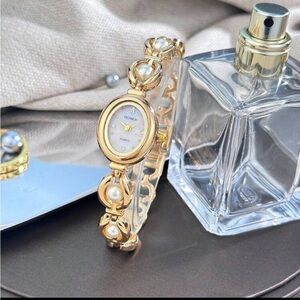Elegant Gold and Pearl Women's Watch